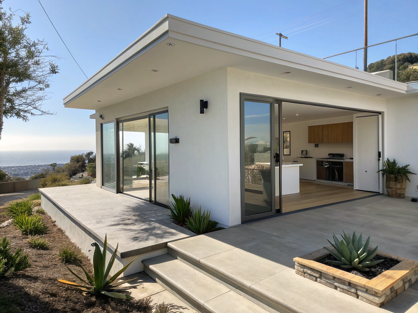 Detached modern accessory dwelling unit in a landscaped residential backyard