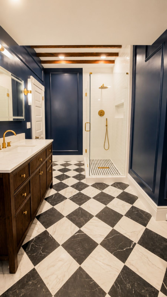 Finished primary bathroom in Redlands with dark wood vanity and glass shower