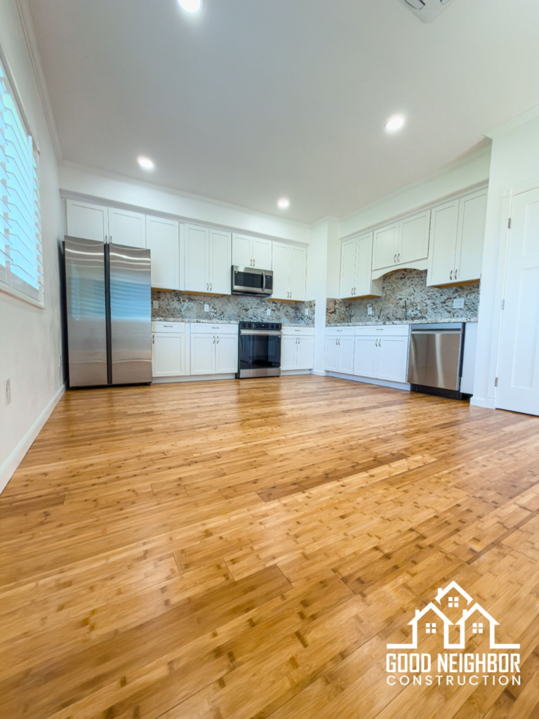 Finished ADU kitchen with white cabinets in Riverside
