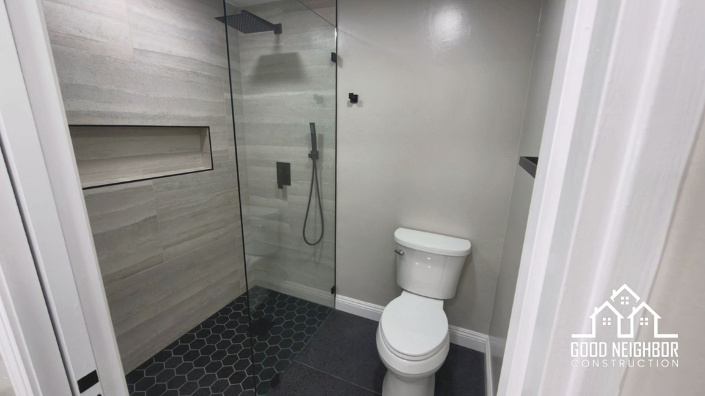 Finished glass shower with gray tile in Riverside