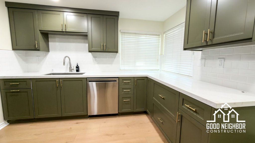 Finished kitchen in Riverside with dishwasher and white counters