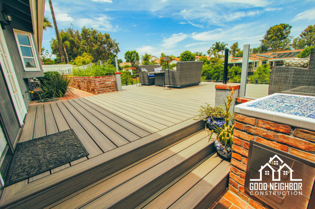Finished elevated deck with outdoor kitchen in Temecula by Good Neighbor Construction